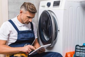 AR Appliance Repair technician fixing washing machine in Boksburg